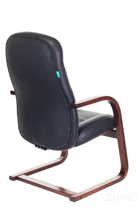 офисное Бюрократ T-9923WALNUT-AV/BL на полозьях низкая спинка черный обивка кожа каркас металл 